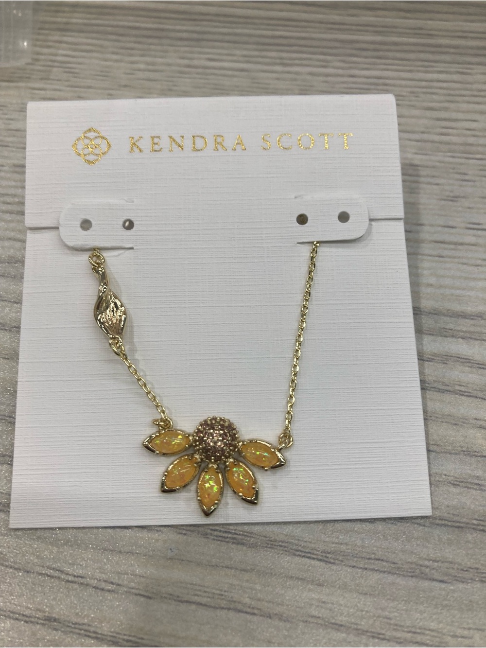 Kendra Scott Gold Sunflower Necklace with Iridescent Peach Petals
